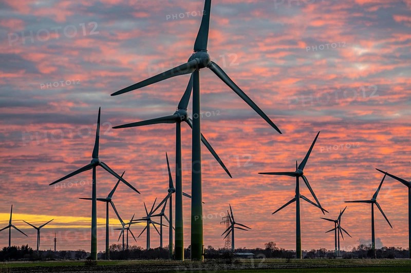 Wind farm near the East Frisian town of Norden, east of the town, sunset, Lower Saxony, Germany, Europe
