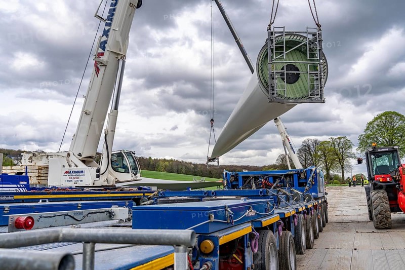 Preparation for the transport of a 68 metre long blade, a wind turbine, with a self-propelled Blade-Lifter vehicle, over a 40 km long route in the Bergisches Land, through towns, villages, over country roads, narrow through roads, to the construction site of the wind turbine near Hagen, North Rhine-Westphalia, Germany, Europe
