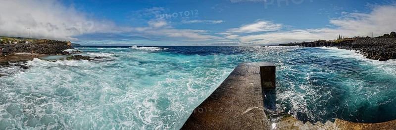 Former whale towing facility in stormy sea with waves and clouds in the sky, whale station and factory, Capelas, Sao Miguel Island, Azores, Portugal, Europe