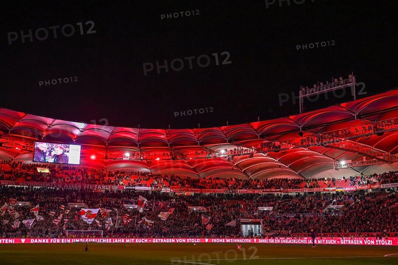 Christmas greetings for fans after Bundesliga football match, VfB Stuttgart versus FC St. Pauli, evening, red illuminated, Cannstatter Kurve, fan block, fans, fan curve, flags, flags, mood, atmospheric MHPArena, MHP Arena Stuttgart, Baden-Württemberg, Germany, Europe