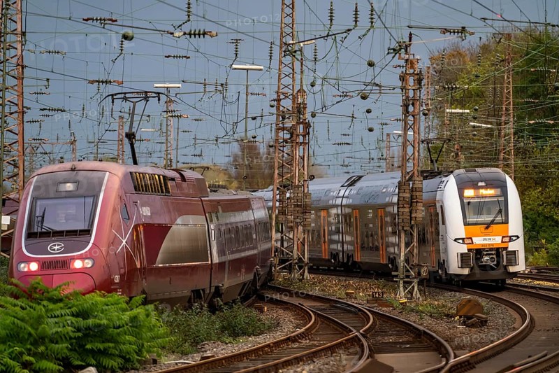 Eurostar train and RRX train leaving Essen Central Station, North Rhine-Westphalia, Germany, Europe