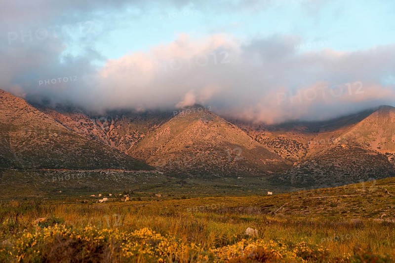 Mountain landscape at dusk with clouds enveloping the peaks in a tranquil rural setting, Itylo, Anatoliki Mani, Mani, Laconia, Peloponnese, Greece, Europe