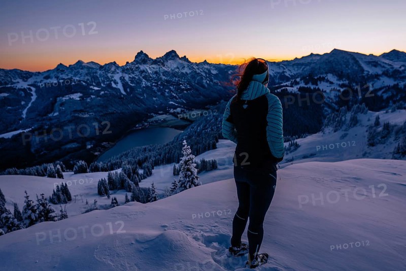 Hiking in the snow in the snow-covered winder landscape in the Alps at Neunerköpfle in the Tannheimer Tal in Tyrol, Austria, Europe