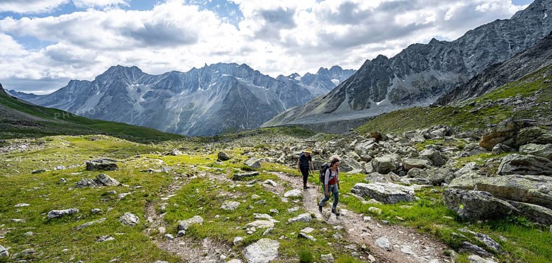 Mountaineer on a hiking trail, mountain landscape near Arolla, ascent to Col de Riedmatten, Valais, Western Alps Switzerland