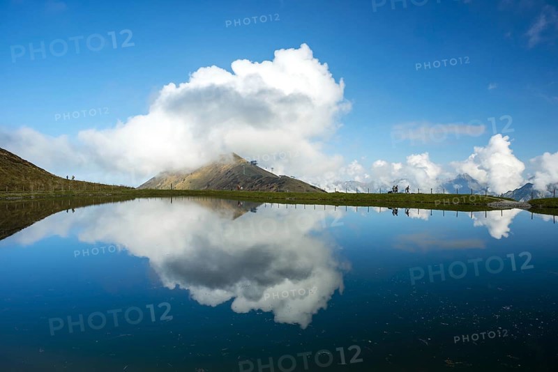 Artificially created lake, snow pond, feeds the snow cannons that completely cover the slopes of the Fellhorn and Kanzelwand cable cars with snow, behind it the Fellhorn, 2038m, Allgaeu, Allgaeu Alps, Bavaria, Germany, Europe