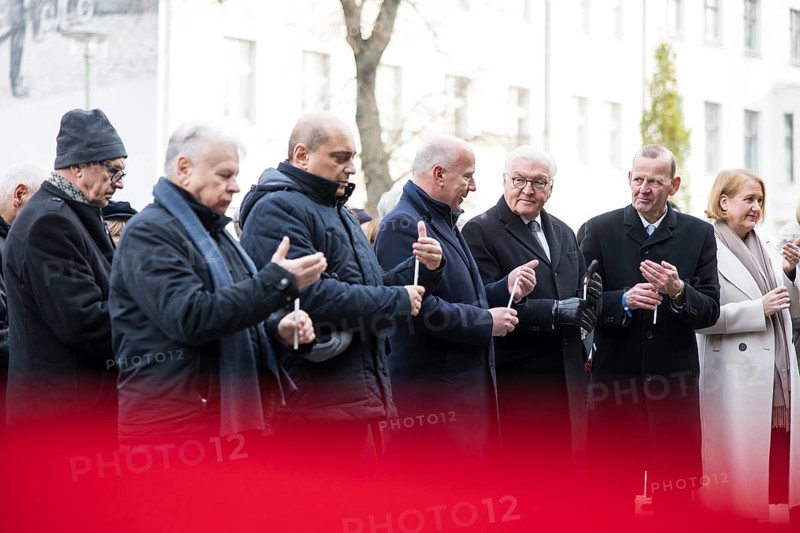 Bogdan Borusewicz (co-founder of Solidarnosc), Kai Wegner (Governing Mayor of Berlin), Frank-Walter Steinmeier (President of the Federal Republic of Germany) and Axel Klausmeier (Director of the Berlin Wall Foundation) light candles at the Berlin Wall Memorial at the central commemorative event at the Berlin Wall Memorial to mark the 35th anniversary of the fall of the Wall in Berlin, 9 November 2024