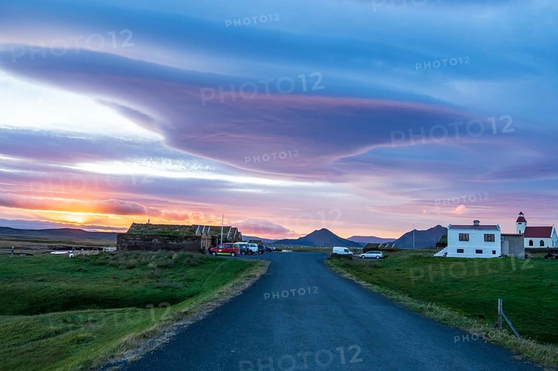 Sunset at Mödrudalur farm and guesthouse, church, dramatic cloud formation, northwest of Egilsstadir, Iceland, Europe
