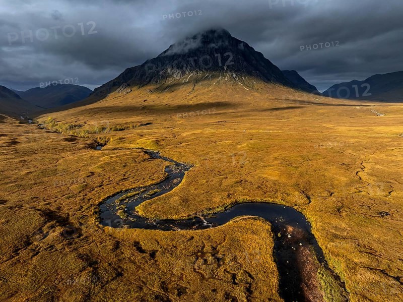Morning light, cloudy mood, sunbeams, river, moor, mountain landscape, aerial view, autumn, view of Buachaille Etive Mòr, Glencoe, Scottish Highlands, Scotland, Great Britain