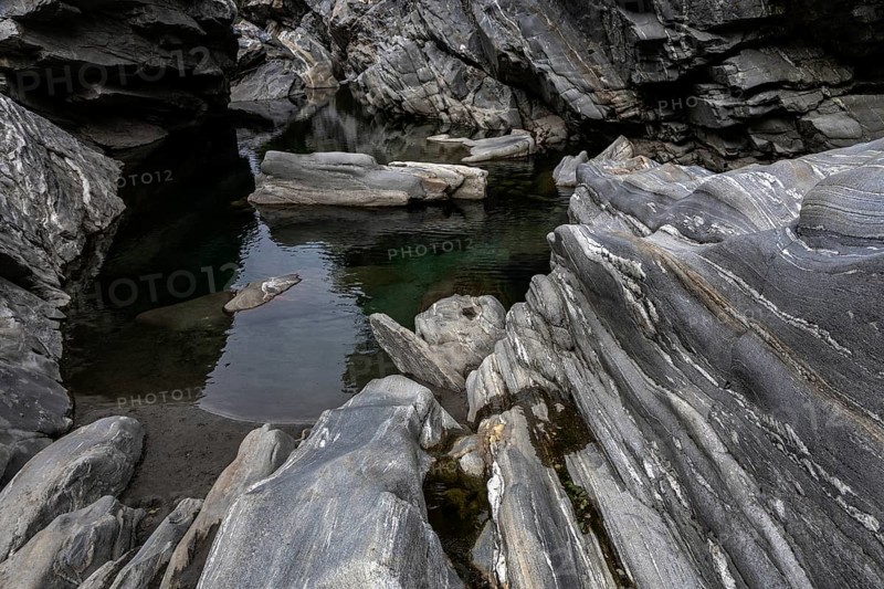 Rocks, granite rock formations in the Maggia River near Ponte Brolla, in the Maggia Valley, Valle Maggia, Canton Ticino, Switzerland, Europe