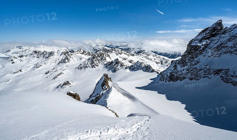 Mountain ridge of Piz Kesch, ascent on Piz Kesch or Piz d'Es-cha in winter, spectacular mountain landscape, view of mountain panorama with glacier Vadret da Porchabella, Albula Alps, Rhaetian Alps, Grisons, Eastern Switzerland, Switzerland, Europe