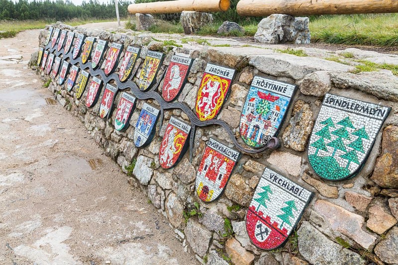Coat of arms of all towns through which the Elbe flows at the source of the Elbe in the Giant Mountains, Czech Republic, Europe