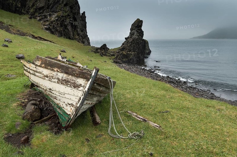 Old boat, coast with fairy, Norðurfjörður, Strandir, Árnes, Westfjords, Iceland, Europe