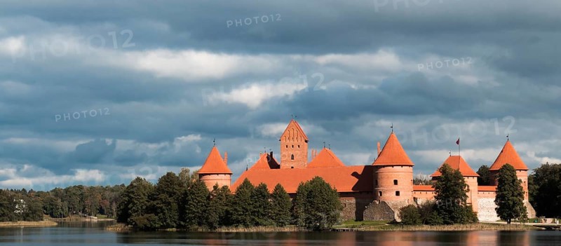 Island castle in Trakai, Lithuania with a cloudy sky in the background