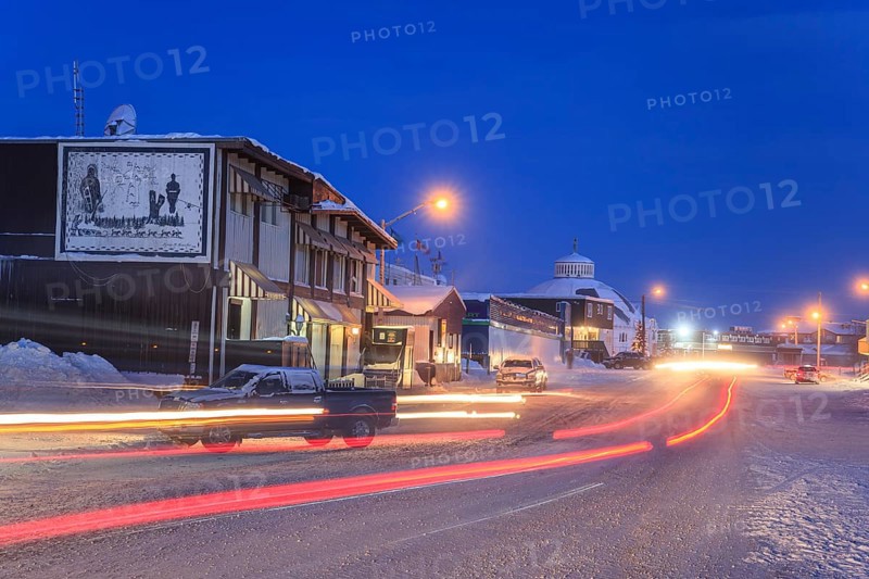 Snowy road, city, cars, buildings, cold, snow, twilight, moonlight, Arctic, Inuit settlement, Inuvik, Northwest Territories, Canada, North America
