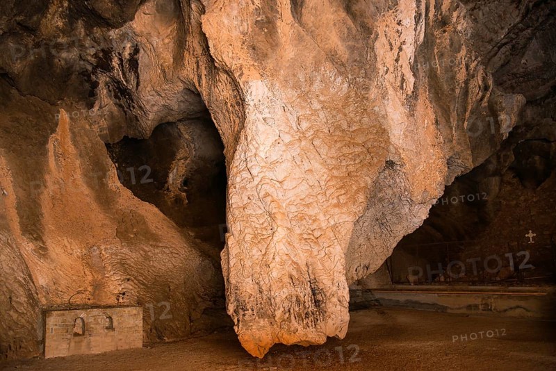 Dramatic limestone formation in a cave with strong textures, Church of Mary the Fountain of Life, Zoodochos Pigi, Rock Church, Kefalari, Argolis, Peloponnese, Greece, Europe