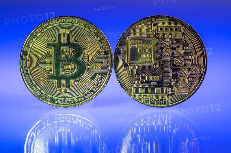 Bitcoin, cryptocurrency, symbol coin, optical placeholder for the digital currency, front and back, symbol of the blockchain