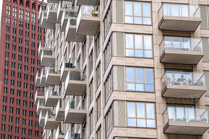 Facades with balconies of high-rise residential buildings, at the Turfmarkt, in the city centre near the central station, Skyline, in the city centre of The Hague, Netherlands