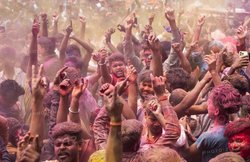 Revellers dancing in the beat of music as they celebrate Holi on a street, the Hindu spring festival of colours on March 25, 2024 in Guwahati, Assam, India. Holi, also known as the Festival of Colors or the Festival of Spring, is one of the most vibrant and joyous festivals in India