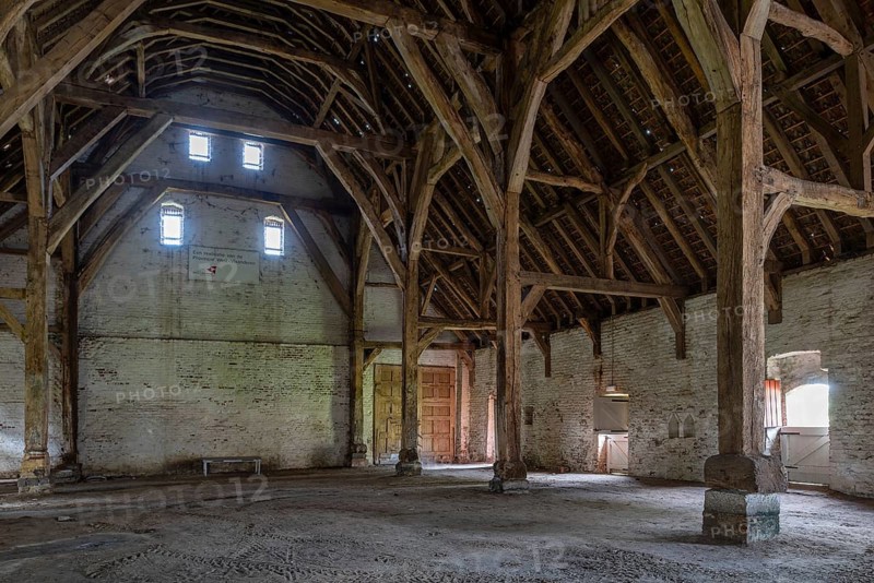 Interior showing wooden truss of 13th century Gothic monastic tithe barn of the Ter Doest Abbey at Lissewege near Bruges, West Flanders, Belgium, Europe