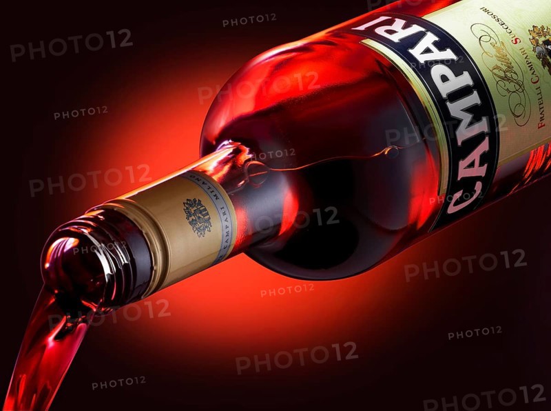Campari is poured from the bottle