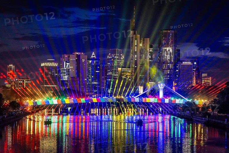 On Wednesday, 12 June 2024, the city of Frankfurt am Main will celebrate the start of the European Football Championship with a spectacular light show from 22:30. The eastern side of the Flößerbrücke bridge will be transformed into a spectacular spectacle of light and colour in the colours of the 24 participating nations, Frankfurt am Main, Hesse, Germany, Europe