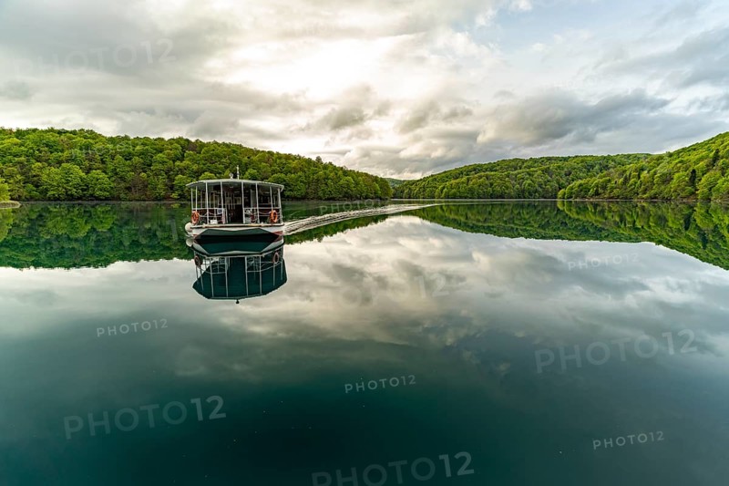 Electric tourist boat on the largest lake Kozjak in Plitvice Lakes National Park, Croatia, Europe