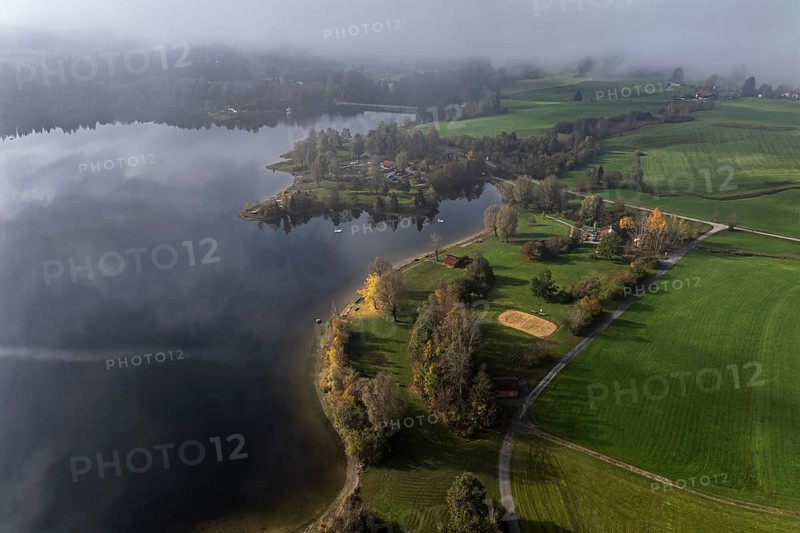 Sports facility and bathing area, lake Rottachsee, shore covered with fog, autumn, aerial view, Allgaeu, Bavaria, Germany, Europe