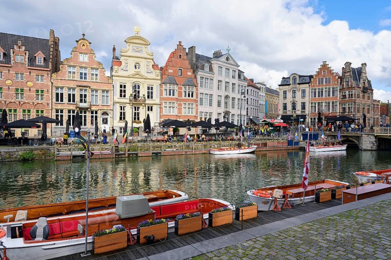 Tourist boats moored along the Graslei, Ghent, Flanders, Belgium, Europe