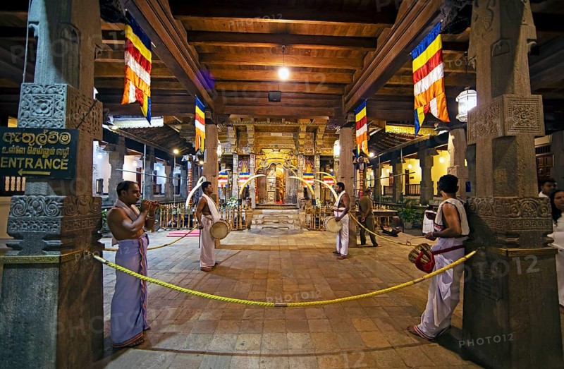 Drummers and flute players at a shrine in the Buddhist Temple of the Tooth or Sri Dalada Maligawa, Kandy, Central Province, Sri Lanka, Asia