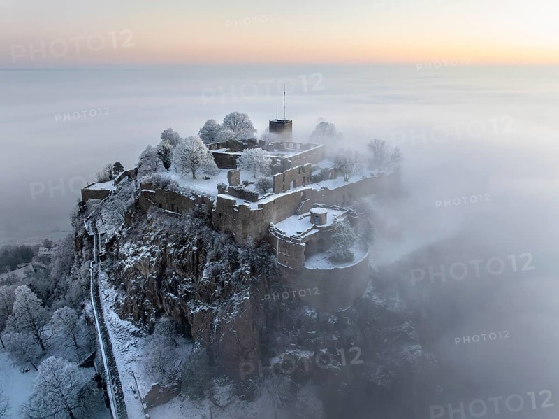 Aerial view of the Hegau volcano Hohentwiel with Germany's largest fortress ruins on a cold, foggy winter morning, in front of sunrise, Singen am Hohentwiel, district of Constance, Baden-Württemberg, Germany, Europe