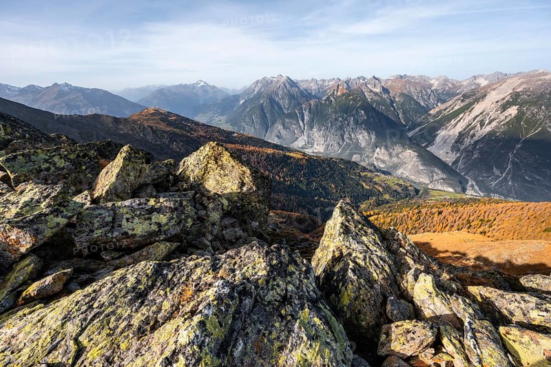 View from the ridge of the Venet to the mountain panorama of the Parzinn Group of the Lechtal Alps, yellow larches in autumn, Venet crossing, Ötztal Alps, Tyrol, Austria, Europe