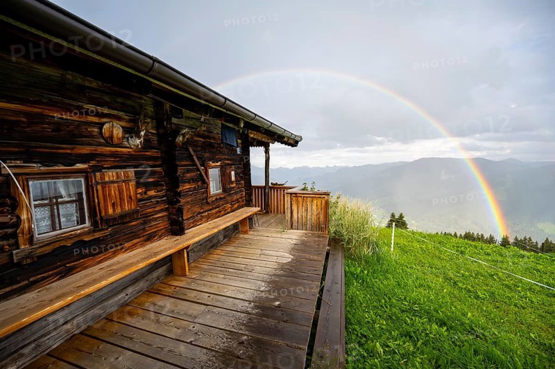 Mountain hut in the rain with rainbow, Hochbrixen, Brixen im Thale, Kitzbühel Alps, Tyrol, Austria, Europe