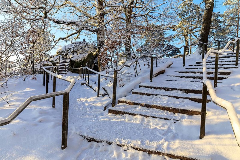 Stairs in a snow-covered rocky landscape on the ascent to the Bastei, turn-off to Kanapee Aussicht, hiking trail from Rathen, Saxon Switzerland, Saxony, Germany, Europe
