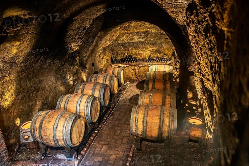 Barrels of wine in old cellar in Melfi, Potenza, Basilicata region, Italy, Southern Europe, Europe