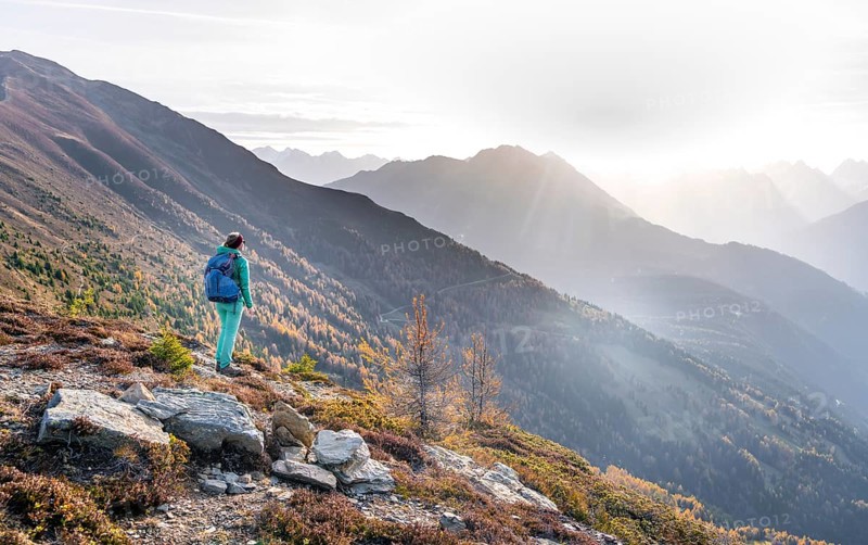 Hiker on the Venet in the morning light, view from Venet, Ötztal Alps, Tyrol, Austria, Europe