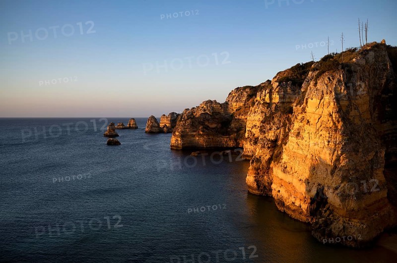 Colourful cliffs and rocks at sunrise on the beach, Praia da Dona Ana, Lagos, cliffs, Atlantic Ocean, Algarve, Portugal, Europe