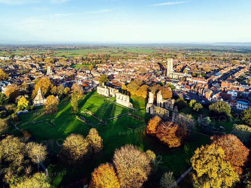 Sunrise over Glastonbury Abbey from a drone, Glastonbury, Somerset, England, United Kingdom, Europe