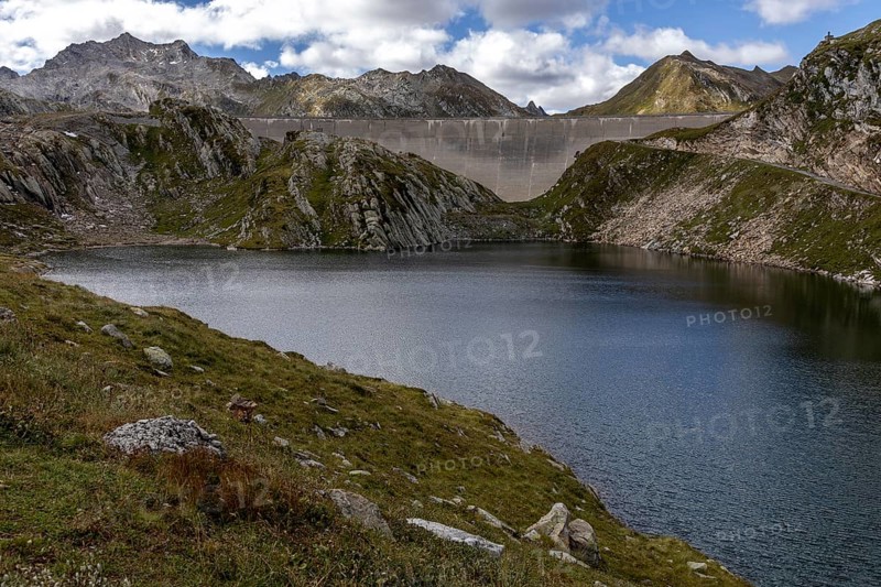 Dam wall of the Naret reservoir, Lago di Naret, in front Lake Scuro, Lago Scuro, behind Ticino mountains, Sambuco valley, Vale Sambuco, near Fusio, Lavizzara, Canton Ticino, Switzerland, Europe