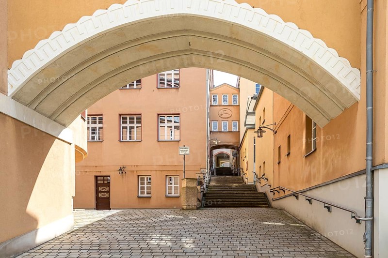 Archway at the New Town Hall with stairs at the portico, the passageway to the AltmarktLichtenstein, Saxony, Germany, Europe