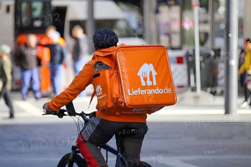 Driver of the food delivery service Lieferando, photographed in the city centre of Mannheim