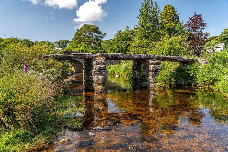 The medieval stone slab bridge Clapper Bridge in Postbridge, Dartmoor, Devon, England, Great Britain