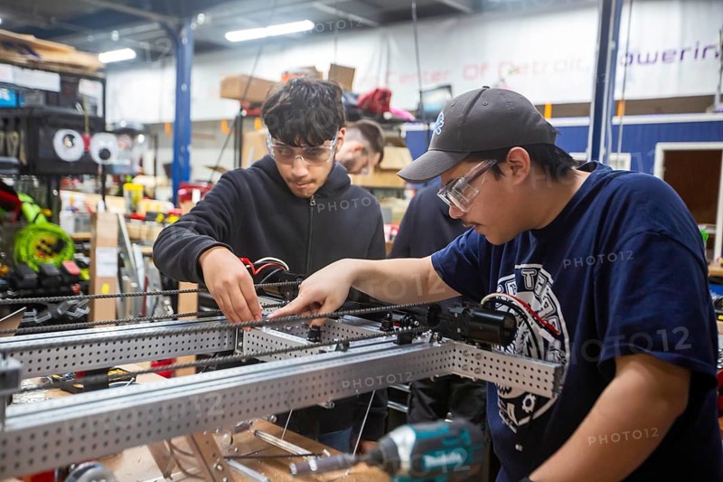 Detroit, Michigan - High school students build robots at the Detroit Hispanic Development Center's Robotics Engineering Center