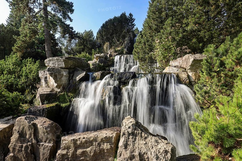 Essen, North Rhine-Westphalia, Germany - Alpinum with waterfall, Grugapark, a park in Essen, emerged from the first Great Ruhrland Horticultural Exhibition in 1929, was the park grounds of the 1965 Federal Garden Show