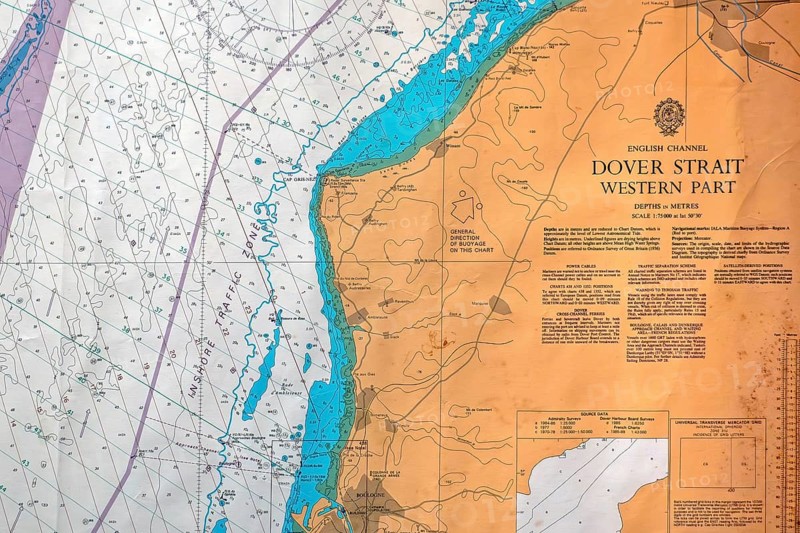 Close-up of nautical map with compass rose of the Dover Strait marking the boundary between the English Channel and the North Sea