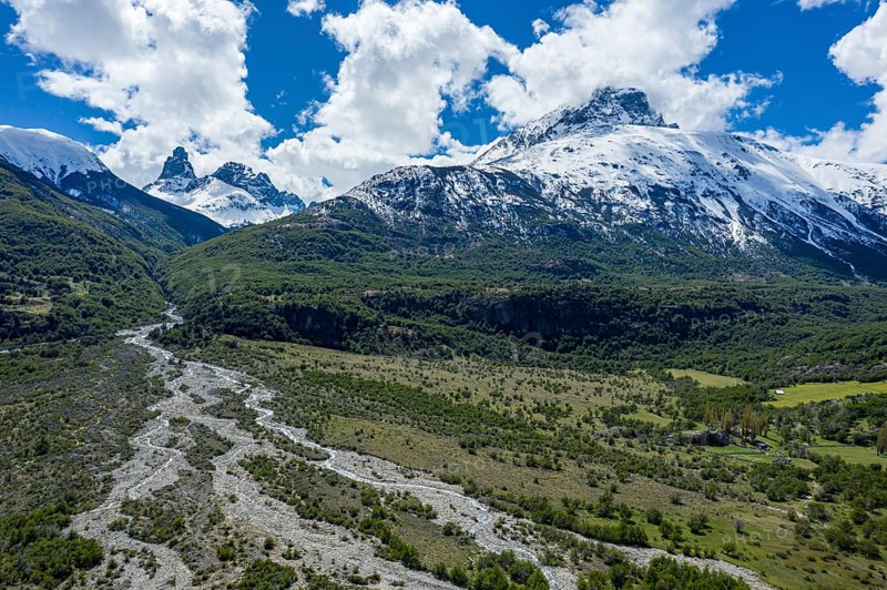 The widely branching arms of river Estero Parada, Mt. Cerro Castillo, aerial view, snow-capped mountains in early spring, Patagonia, Chile, South America