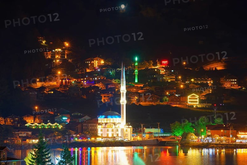 Uzungol mosque reflecting in the lake at night, Trabzon, Turkey, Asia
