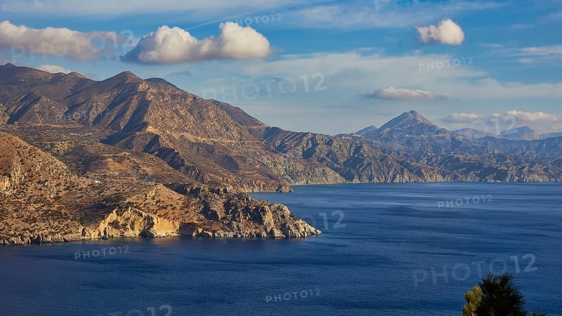 Panorama of mountains and sea in sunny weather, morning light, sunrise, coastal road, east coast, Karpathos, Dodecanese, Greek Islands, Greece, Europe