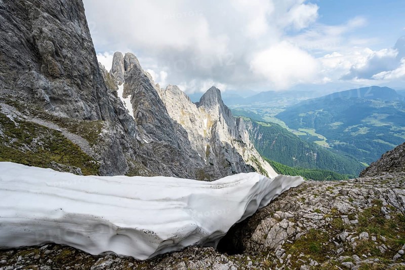 Residual snow in a saddle in spring, rocky mountain landscape, ascent to the summit of the Ackerlspitze, Wilder Kaiser, Kaiser Mountains, Tyrol, Austria, Europe