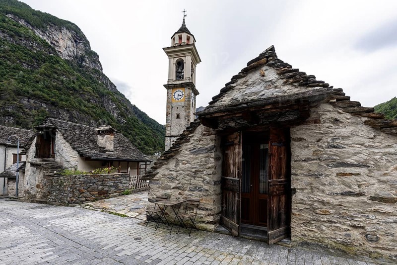 Typical Ticino stone houses and church in the village of Sonogno, Verzasca Valley, Valle Verzasca, Canton Ticino, Switzerland, Europe