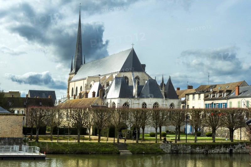 Nemours. Saint-Jean-Baptiste church on river Loing. Seine-et Marne department. Ile-de-France. France. Europe
